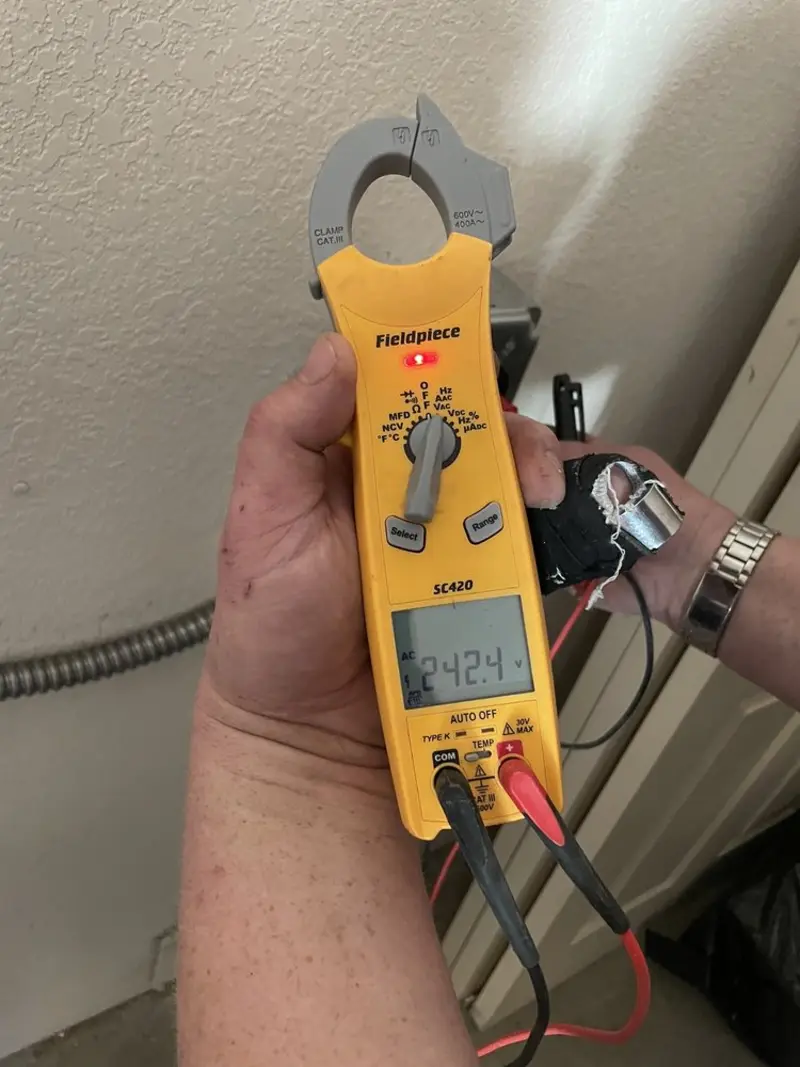 Voltage testing with clamp meter during Ceiling Fan Installation in Plain City